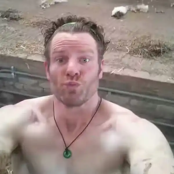 Photos: Farmer strips naked and performs press ups on the back of moving pickup for charity
